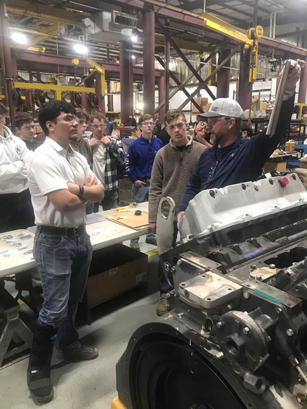 Student interns training at the HOLT CAT Longview Power Systems shop