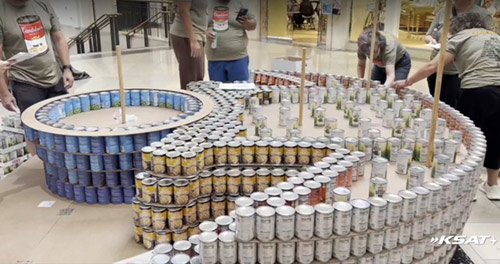 San Antonio Teams Build Giant Can Sculptures to Fight Hunger at North Star Mall