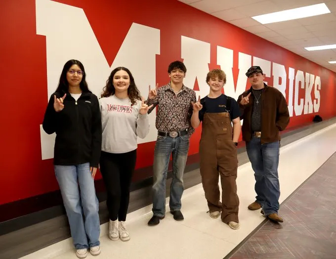 Diana Lopez, Anika Kerr, Brayden Figueroa-Cruz, Wyatt Newman and Thomas Hays learning industry skills at Marshall High School