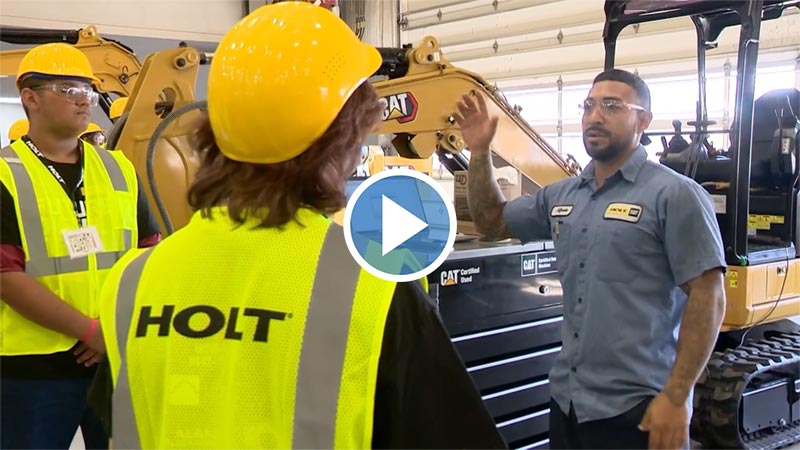 HOLT CAT technicians work with local high school students during Technicians for the World Pre-Apprenticeship Day